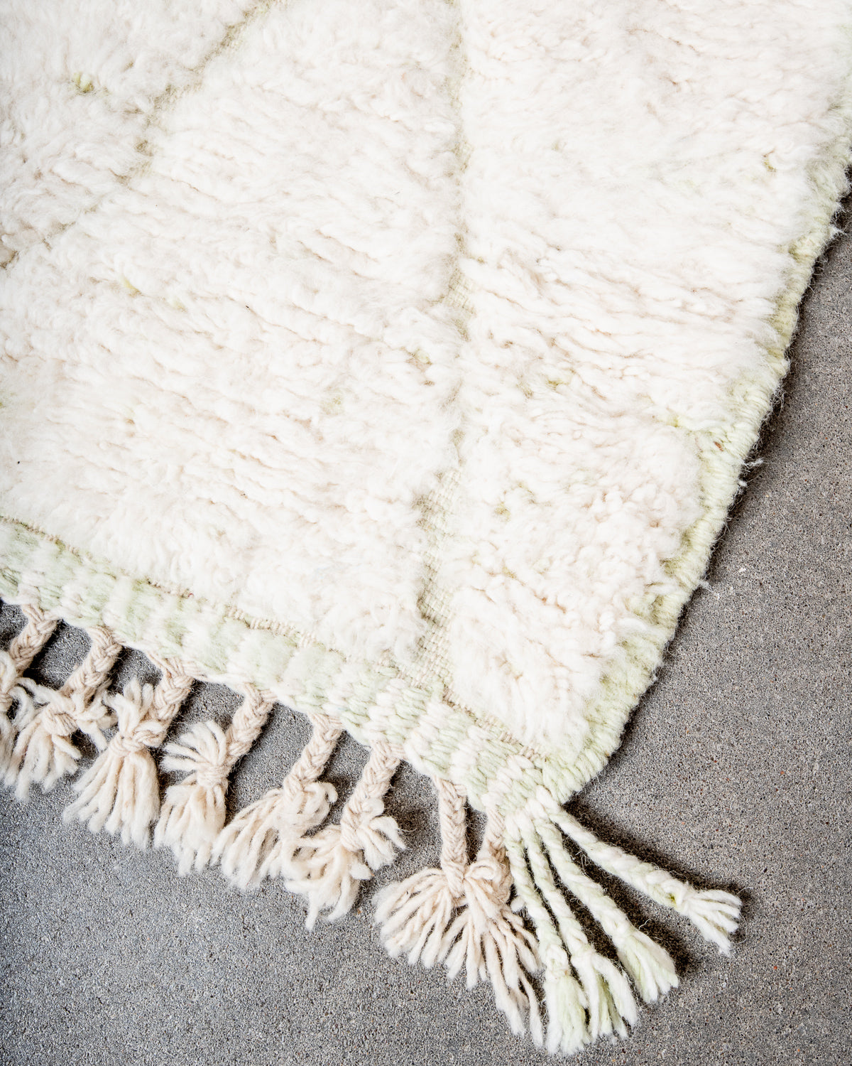 Modern, designer, handcrafted Berber rug from Morocco. Beniourain carpet with beautiful colours and patterns and fluffy wool texture.